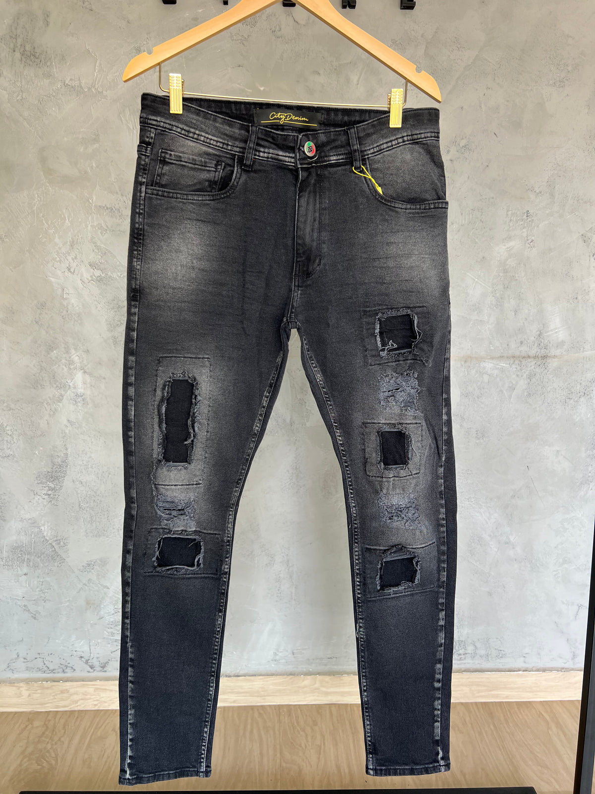 Calça Jeans Jogador rasgada escura