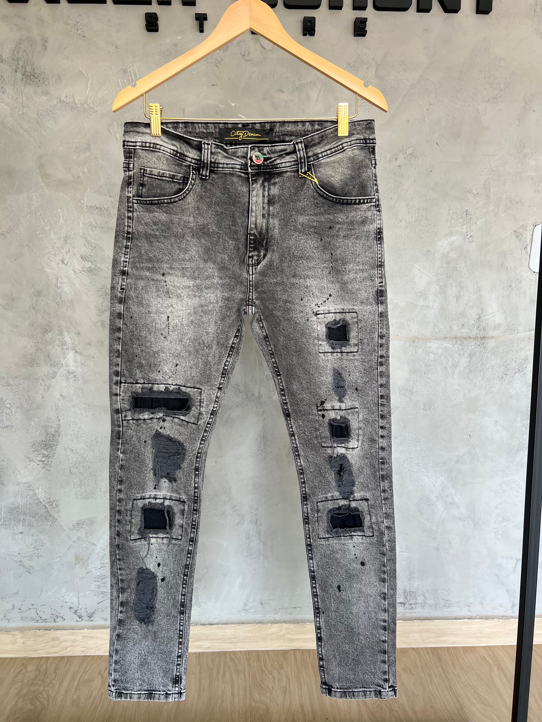 Calça Jeans Jogador Rasgada